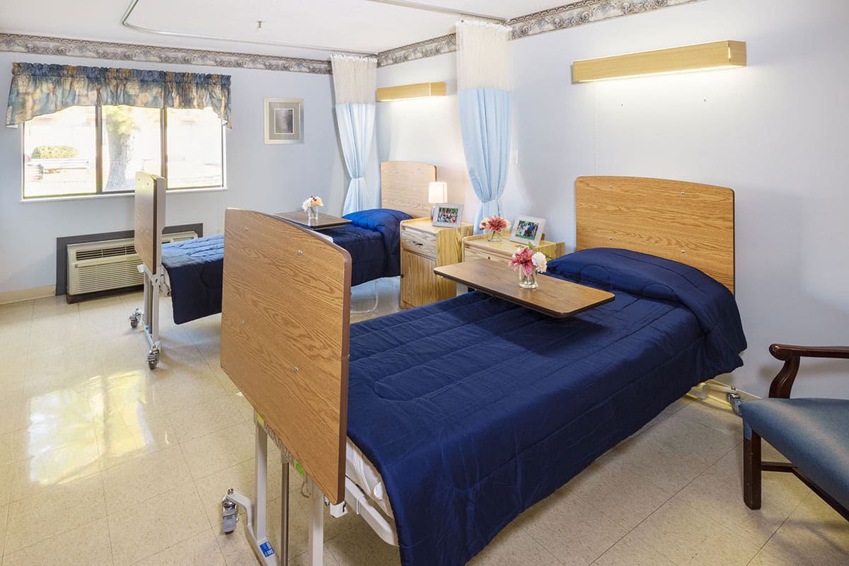 a semi-private room at the Willow Knoll facility
